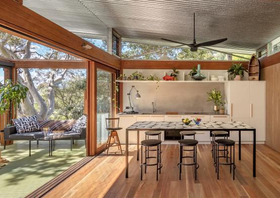 a dining room with a table and chairs