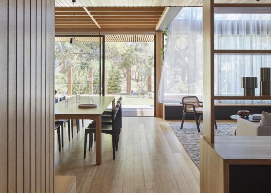 a room with a table and chairs