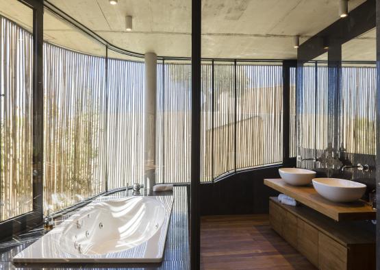 a bathroom with a tub and sink