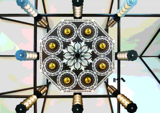 a ceiling light fixture with a flower design