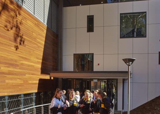 a group of people standing on a deck