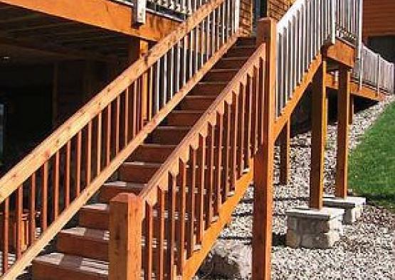 a wooden staircase outside of a building