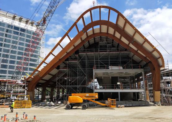 a building under construction with a crane