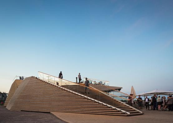 a group of people walking up stairs