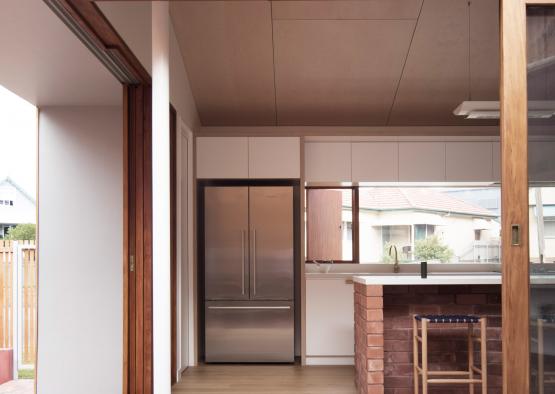 a kitchen and a bar in a house