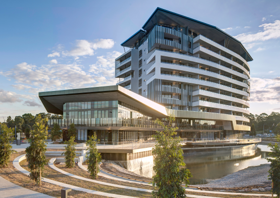 a building with a river in the background