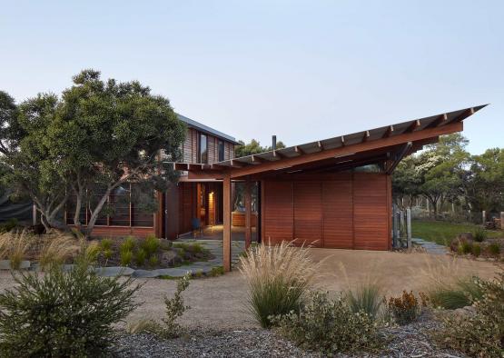 a house with a roof and a yard