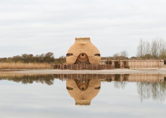 a round structure with a eye on it