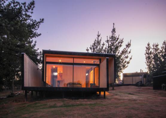 a building with a glass wall and a window