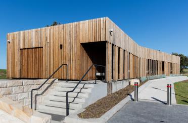 a building with a wooden wall