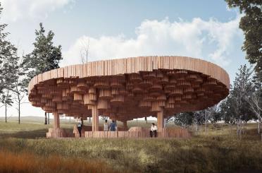 a group of people standing under a structure