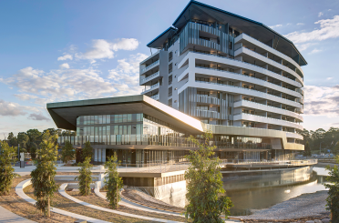 a building with a river in the background