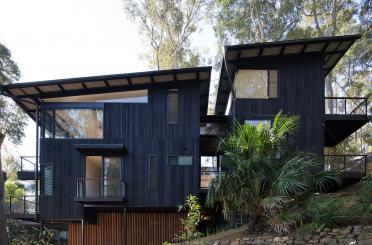 a house with trees in the background